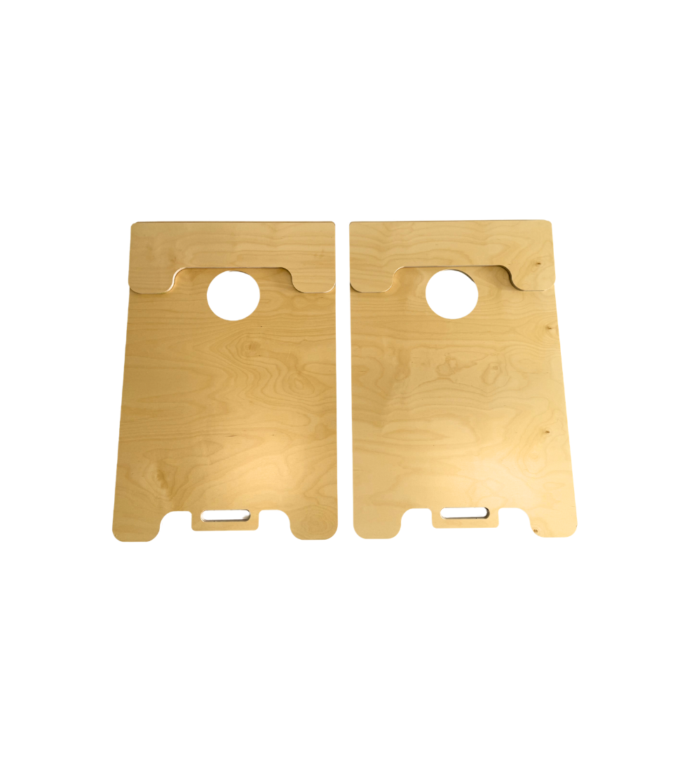 Two wooden cornhole boards on a white background