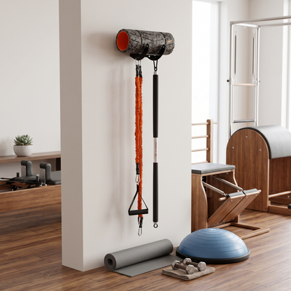 Gear hook mounted on a wall in a pilates style studio.