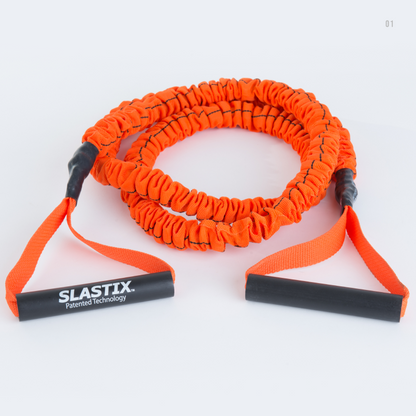 An orange Slastix with black handles and black connectors, coiled on a white background. The left handle is extended and shows the brand name 'SLASTIX' in white text.