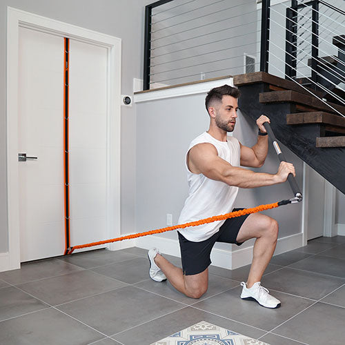 Man in a lunge using a resistance band