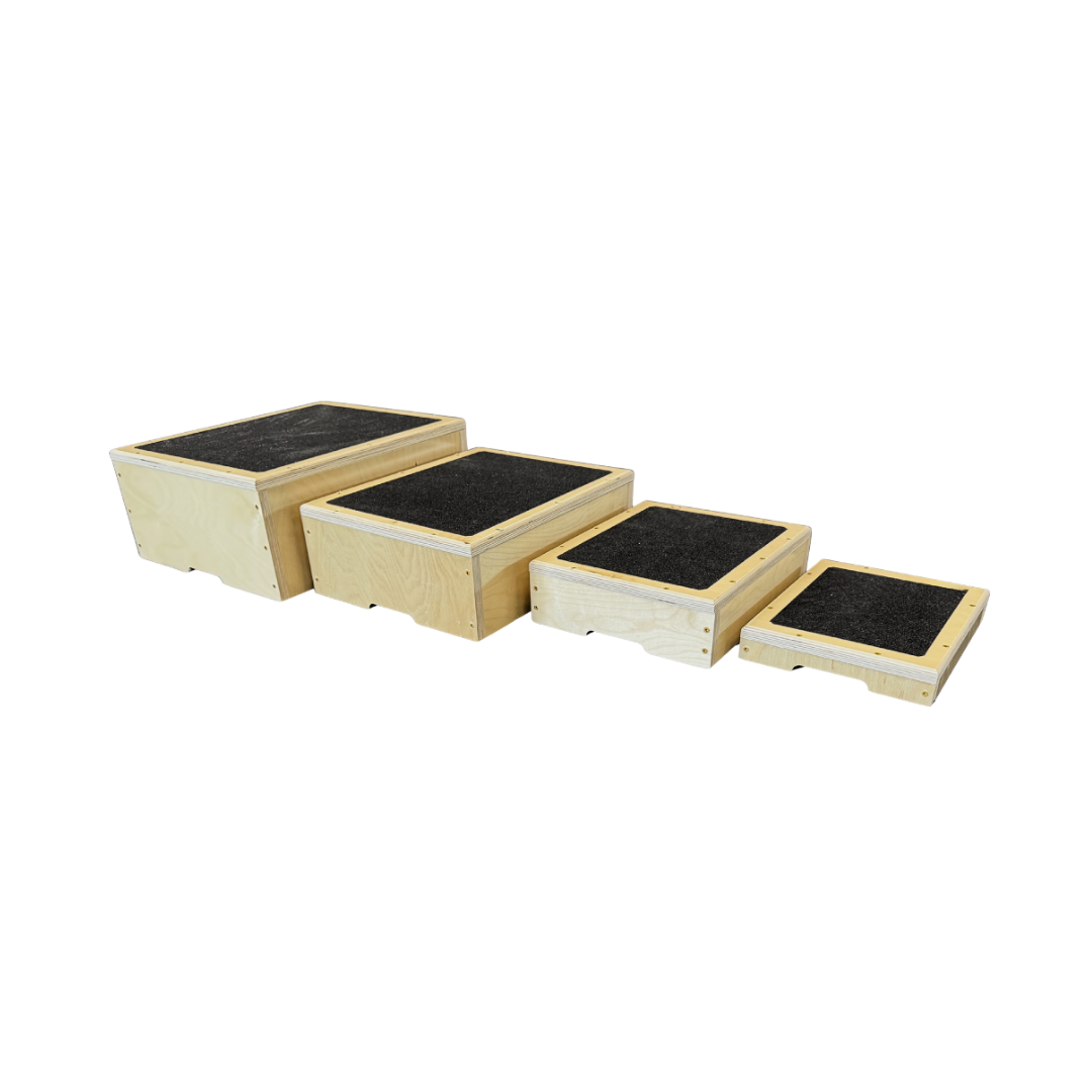 Set of wooden step platforms with black platforms on a white background