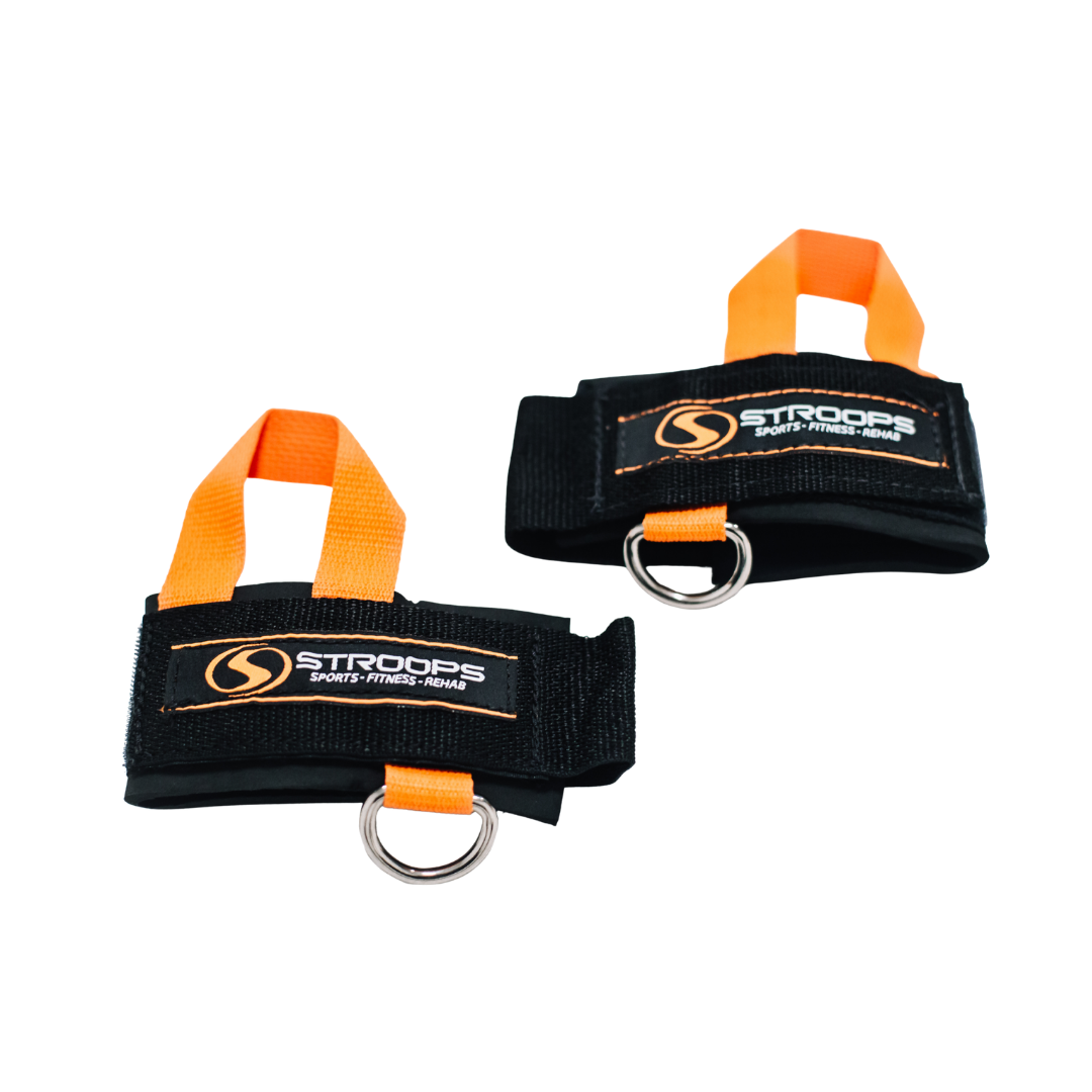 Two black wrist straps with orange loops and metal rings on a white background, branded 'STROOPS'.