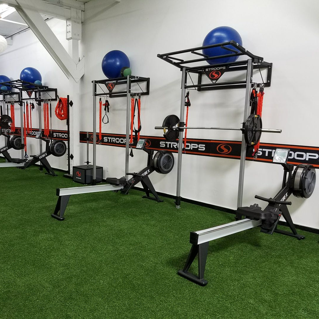 Stroops equipment and products in a gym room.