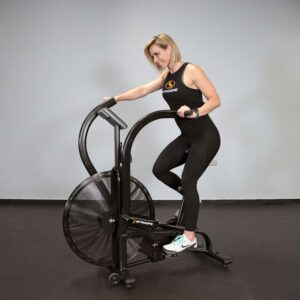 Stroops trainer Aly working out on Stroops Air Bike