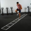 Stroops athlete doing workout using Stroops roll out ladder