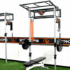 Bench press set up under a Stroops performance station in the studio gym