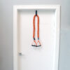 Stroops Toner anchored with door anchor to a white door