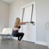 Stroops trainer Danielle doing Dorbarre exercise from home