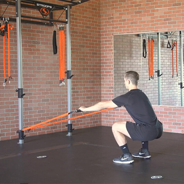 Stroops trainer Caysem doing Fit Stik Pro squat row