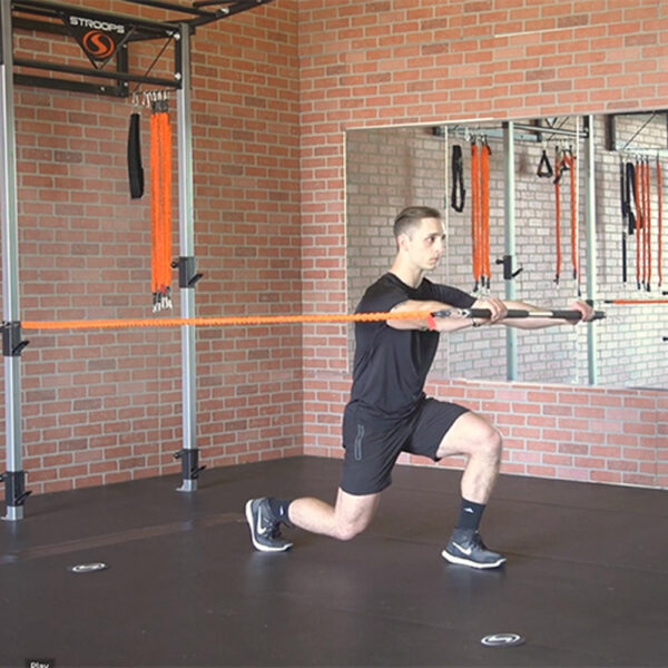 Stroops trainer Caysem doing fit stik pro static lunge with press