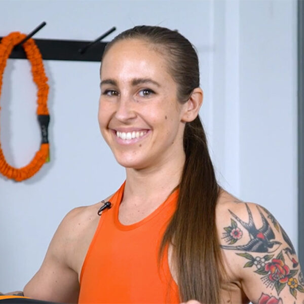 Stroops trainer Melissa smiling before doing a Resistance 90 workout