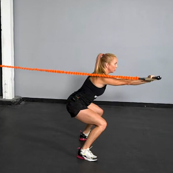 Stroops trainer Danielle doing Resistance 90 180-degree squat jump