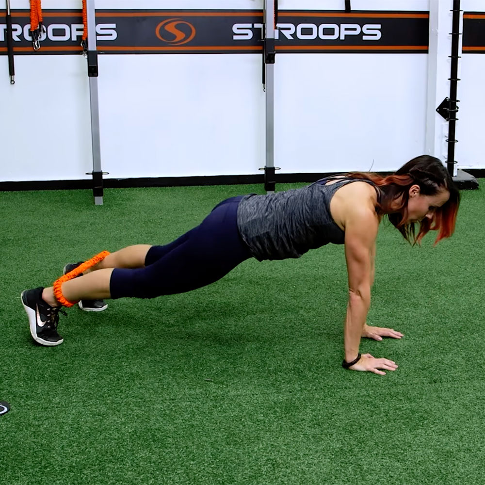 Stroops trainer Aly doing loop plank ups
