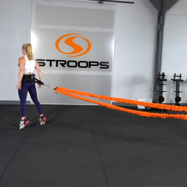Stroops trainer Danielle doing Son of the Beast squat thrust heel lift