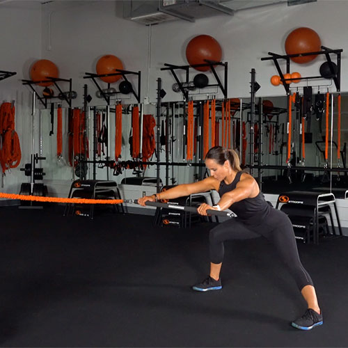 Stroops trainer Aly doing Fit Stik Pro Side Lunge With Row