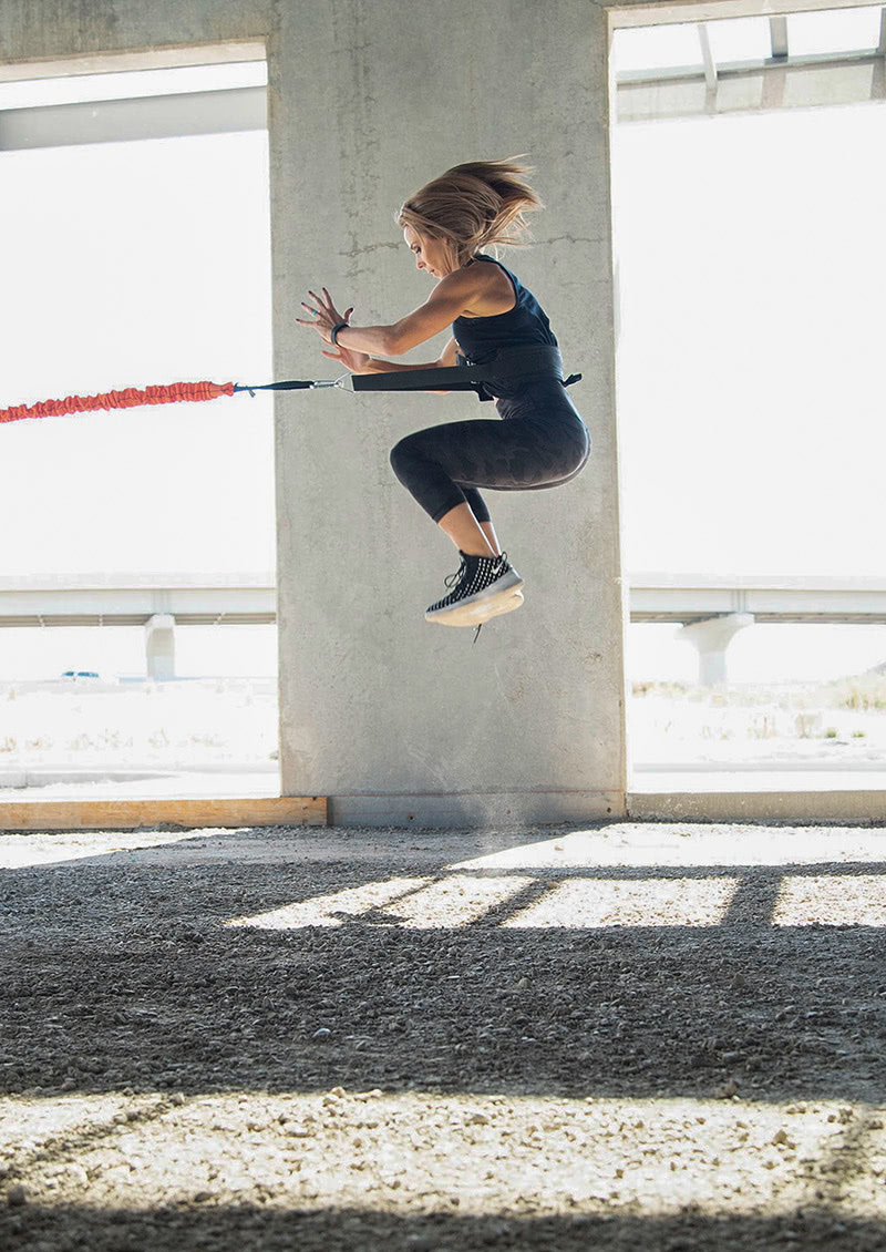 stroops coach Aly purdy jumping with the Power Pull Belt