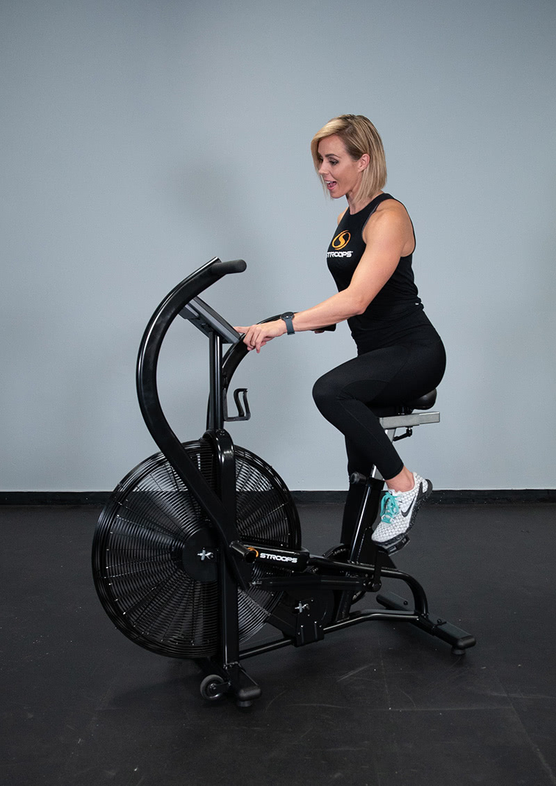 stroops coach aly purdy showcasing the stroops air bike