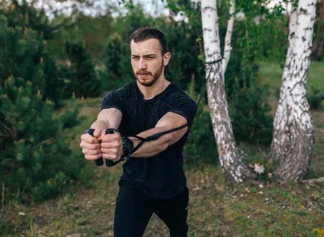 man exercising in fall